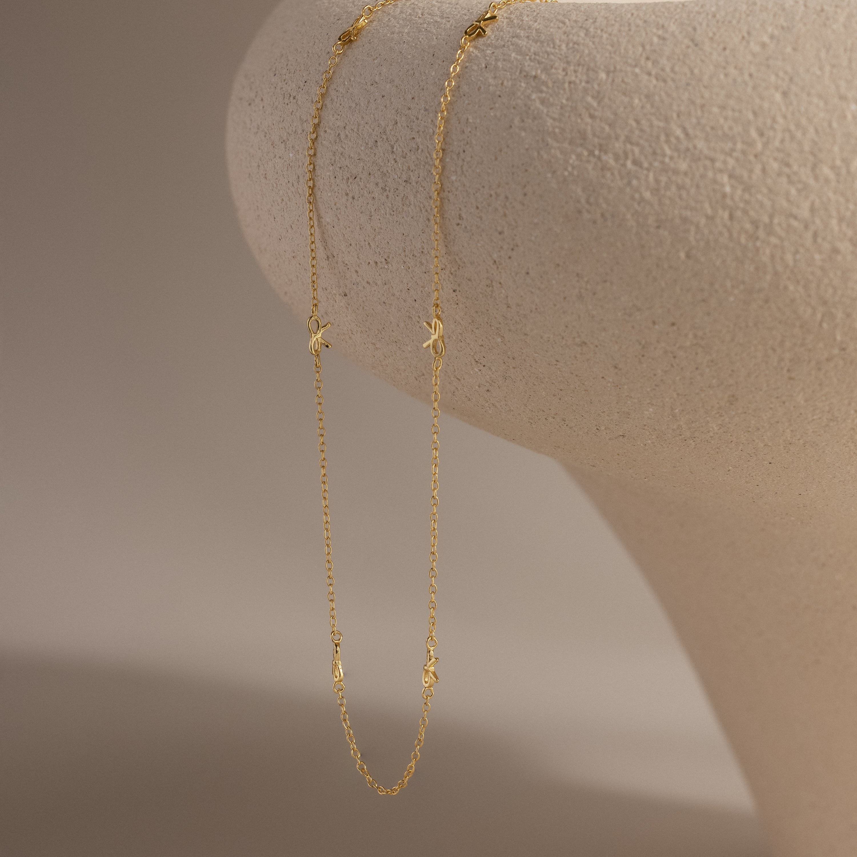Bow Station Necklace