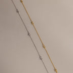 Bow Station Necklace