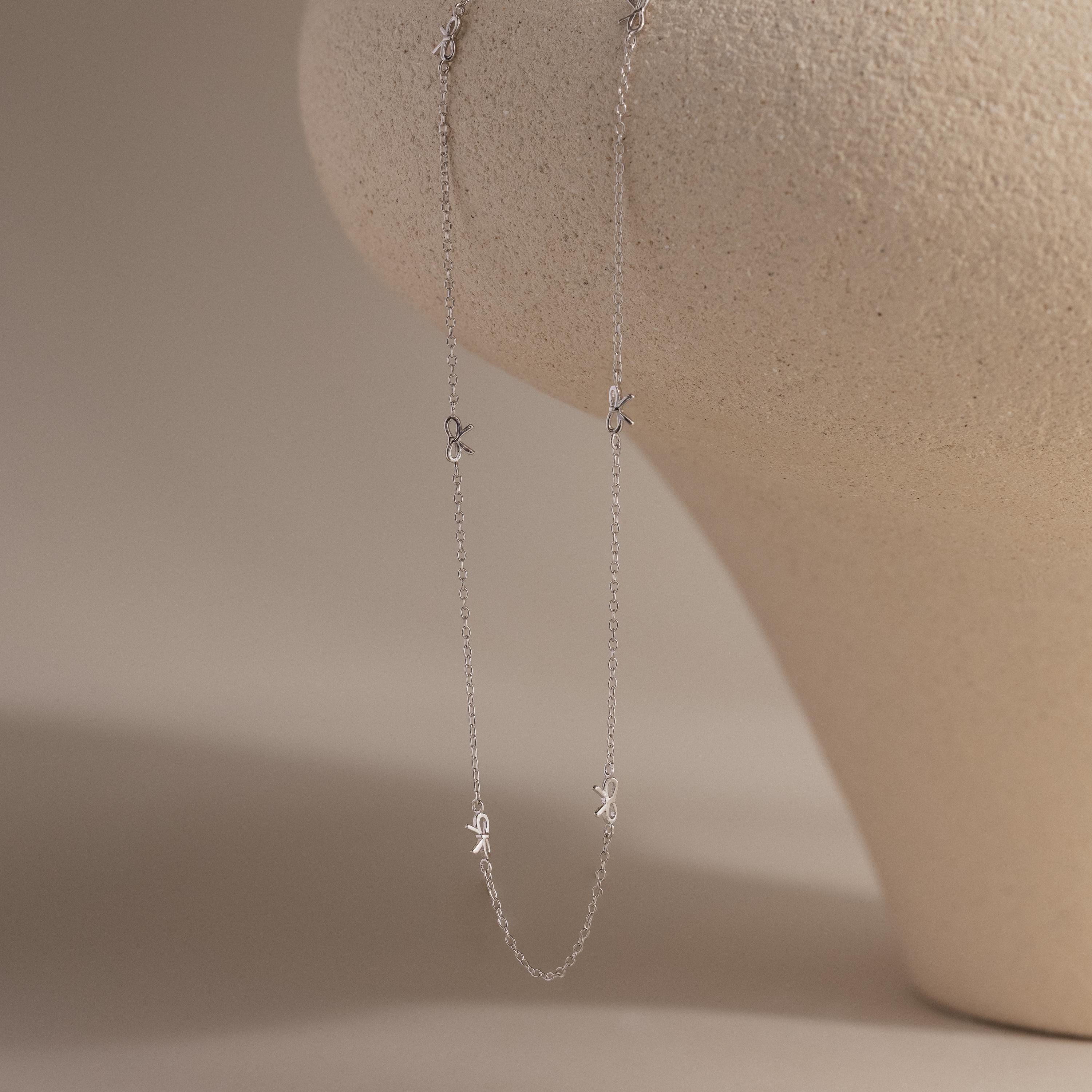 Bow Station Necklace