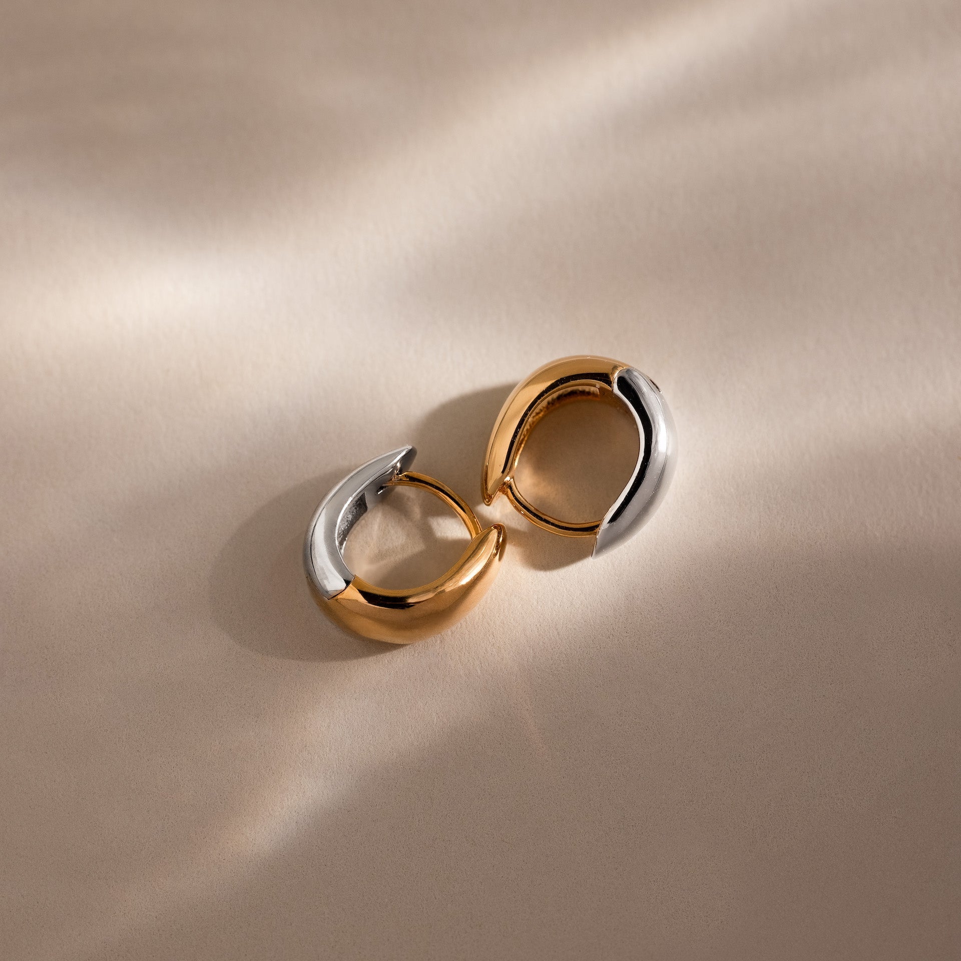 Bold Mixed Metal Huggies
