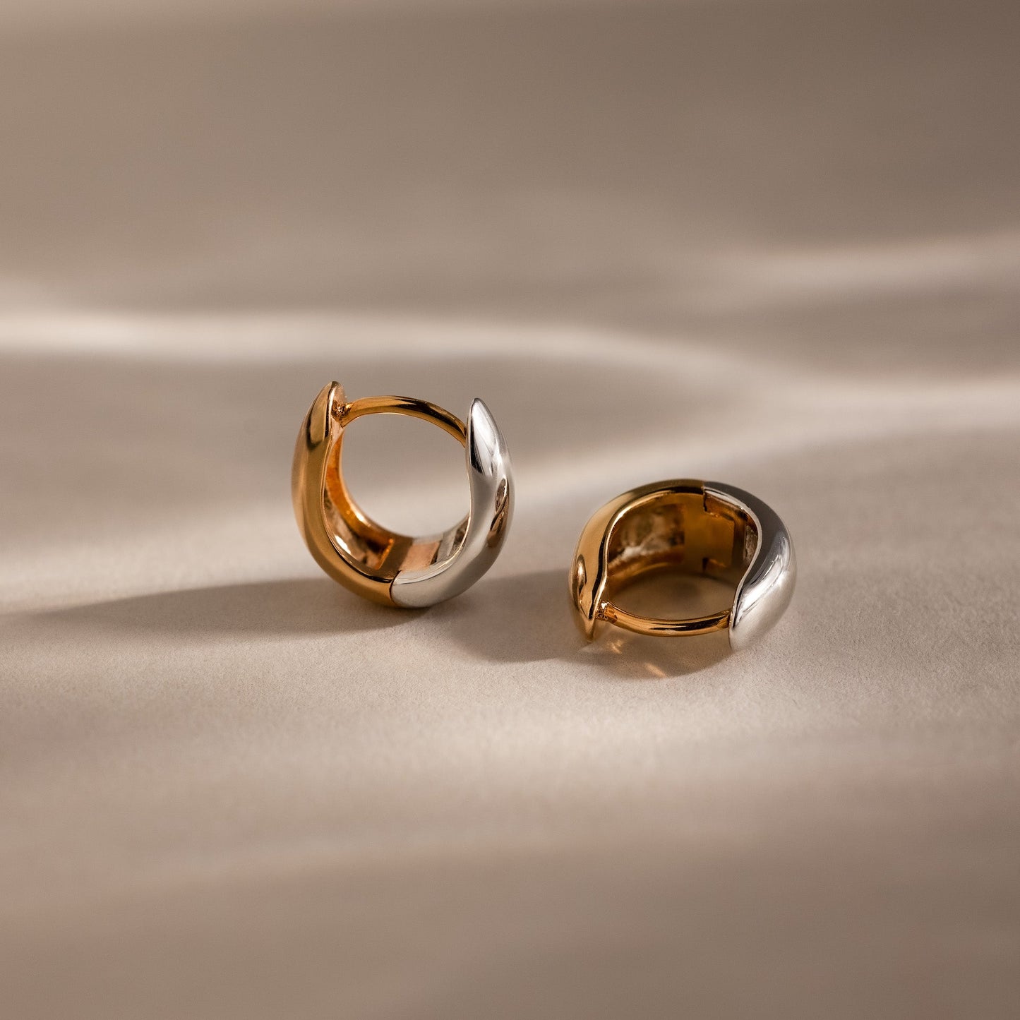 Bold Mixed Metal Huggies