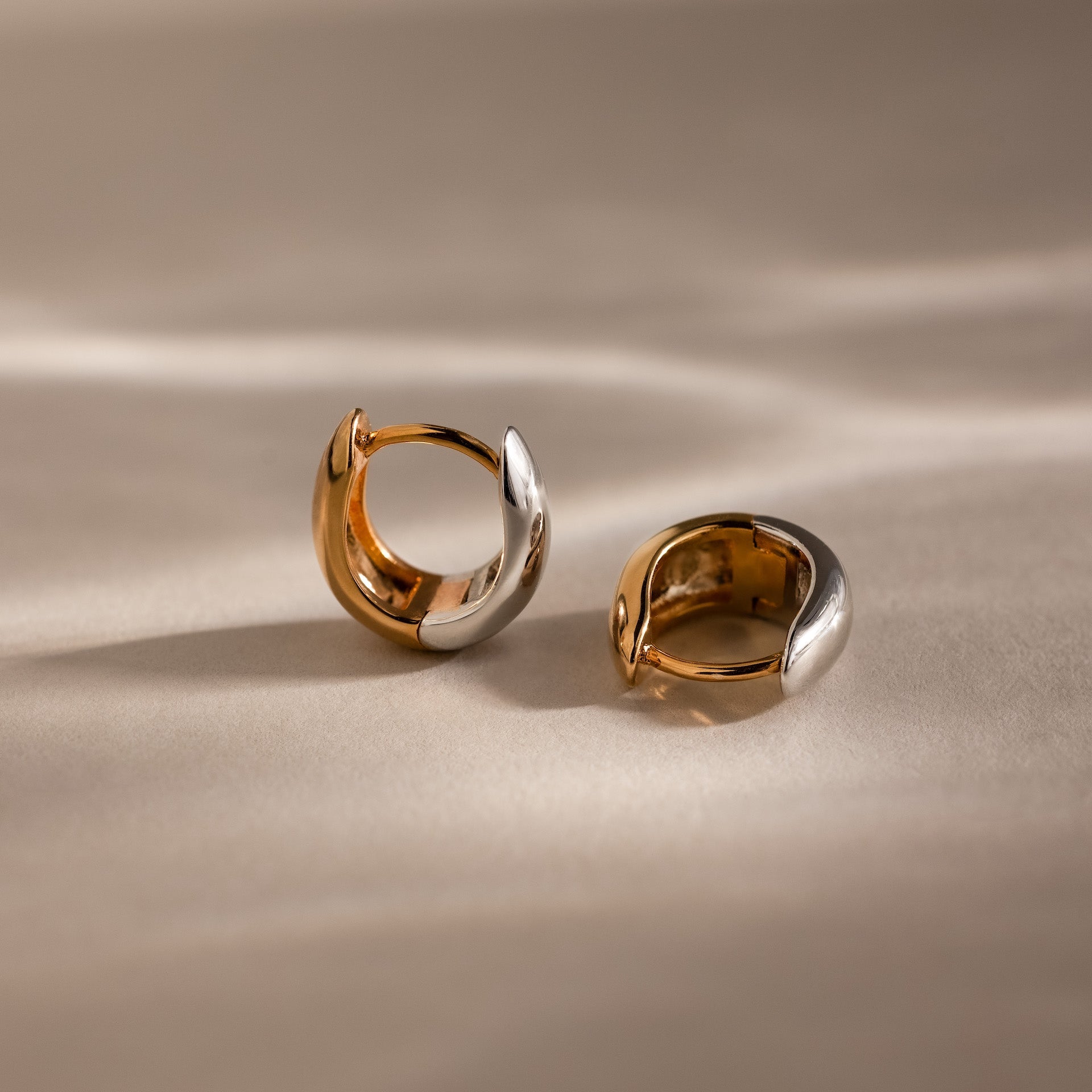 Bold Mixed Metal Huggies